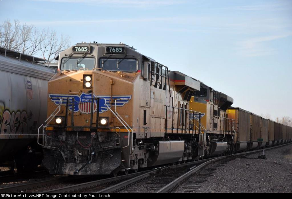 Loaded coal train rolls south